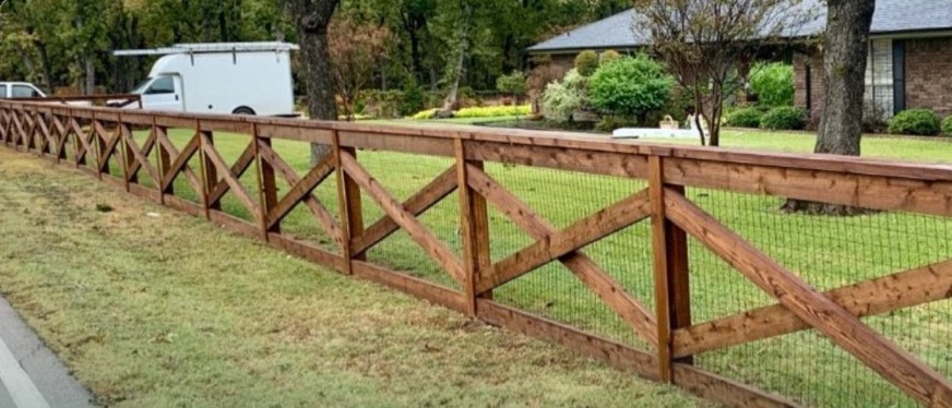 Ranch fence line where pipe and bull gates secure acreage access